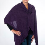 Picture of dark purple knit shoulder wrap that is chemo port accessible and picc line accessible