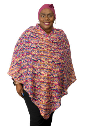 Lightweight, breathable sunset color poncho that is chemo port accessible and picc line accessible. A stylish accessory that takes you from chemo treatment to going out with friends.