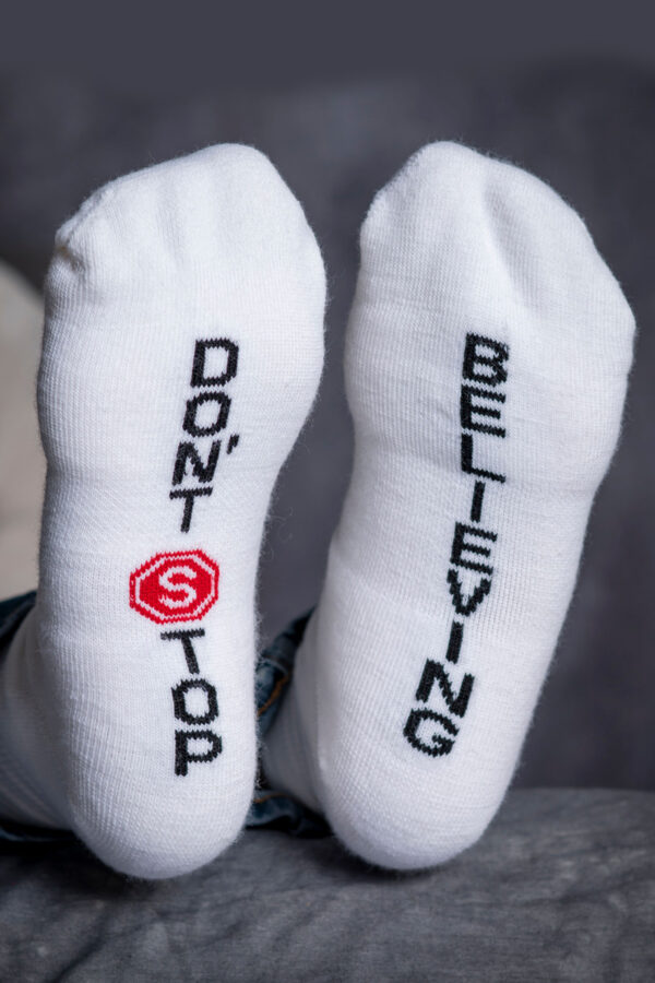 Don't Stop Believing inspirational socks gifts for women and men with cancer or serious illness