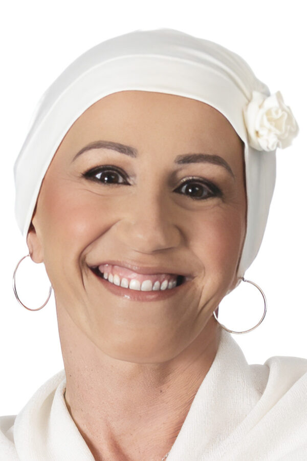 Soft cream head cover for women with hair loss due to chemo or alopecia.